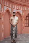 Men attire brown dhoti with cream uparana