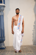 Man wearing a shankh design border white cotton dhoti with uparana