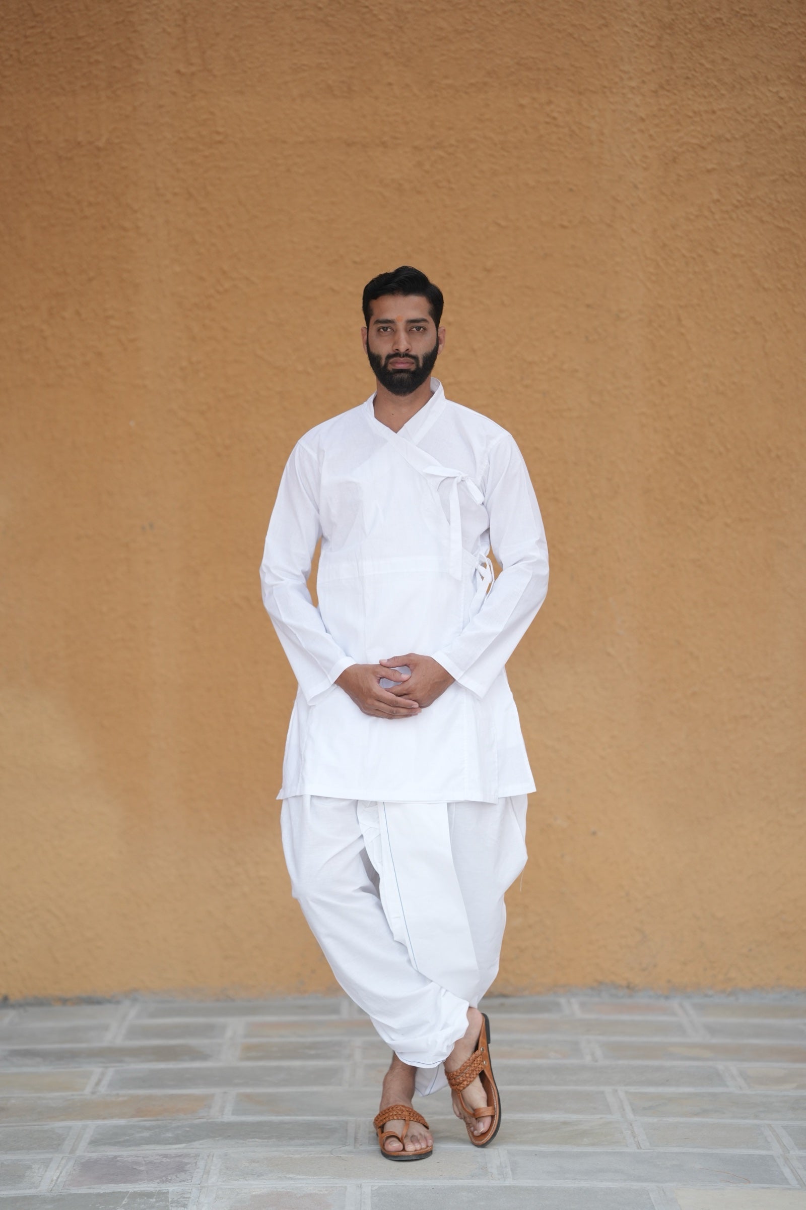 Man wearing a white bagal bandi with white readymade cotton dhoti