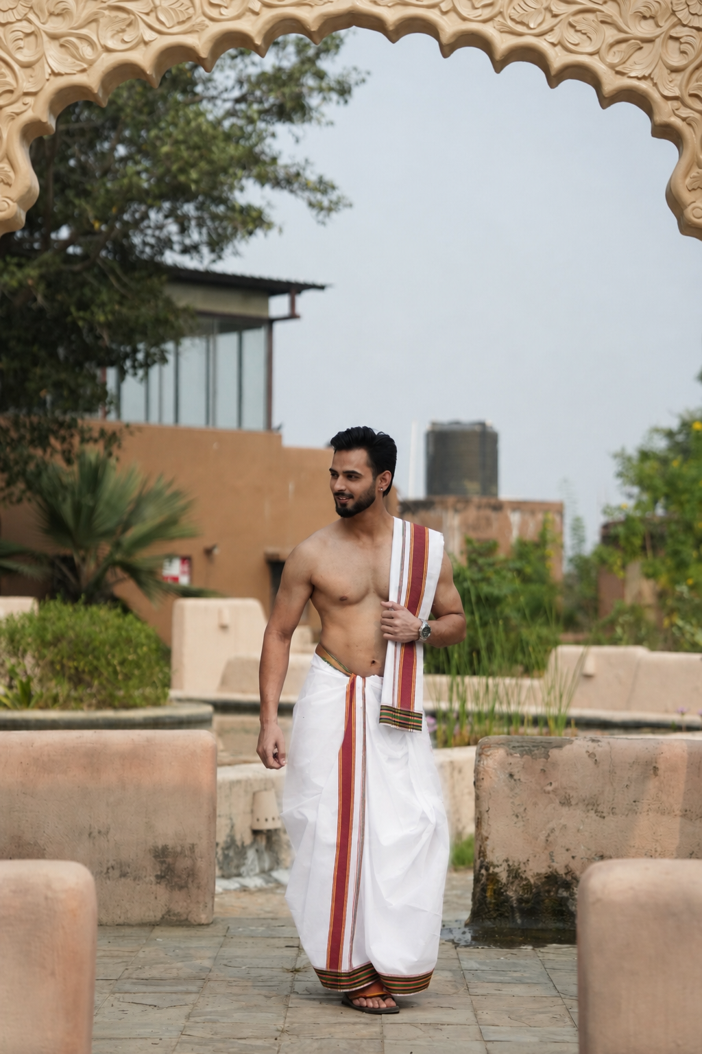 Man wearing a brown and multicolour white cotton dhoti with uparana