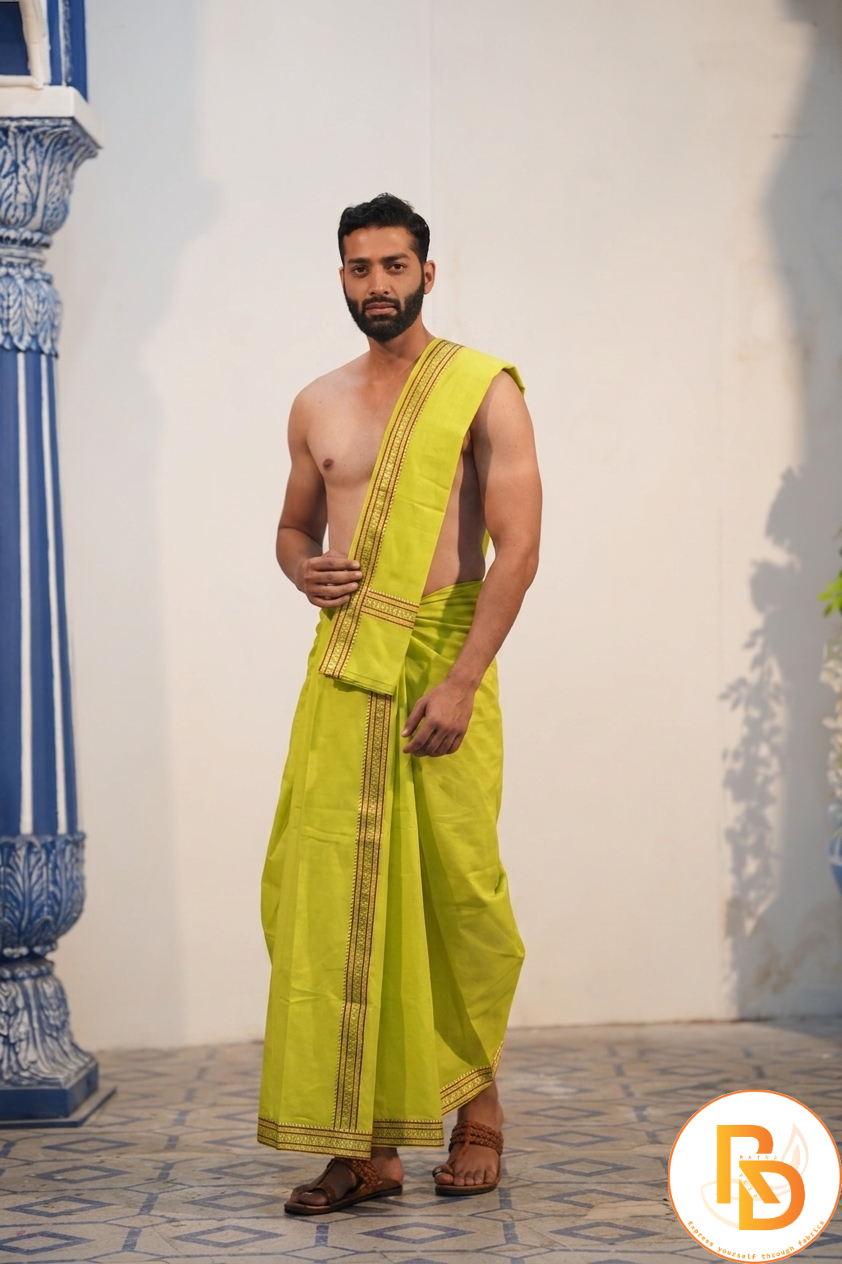 Man wearing a elegant silk rudraksh border yellow dhoti with khes