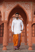 Man wearing a elephant design border orange dhoti and shirt combo