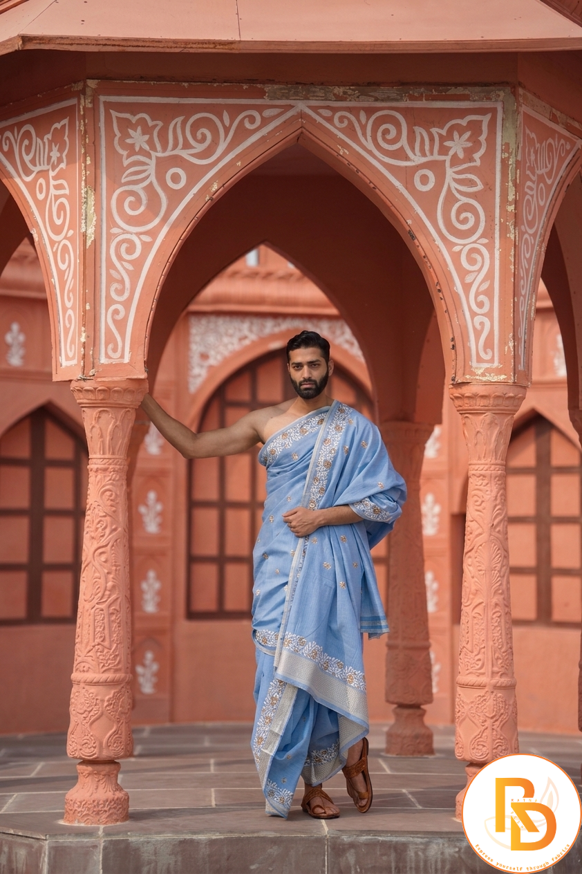 Man wearing a floral border sky blue dhoti with uparana