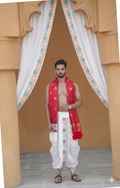 Man wearing a floral border white cotton dhoti with gamcha