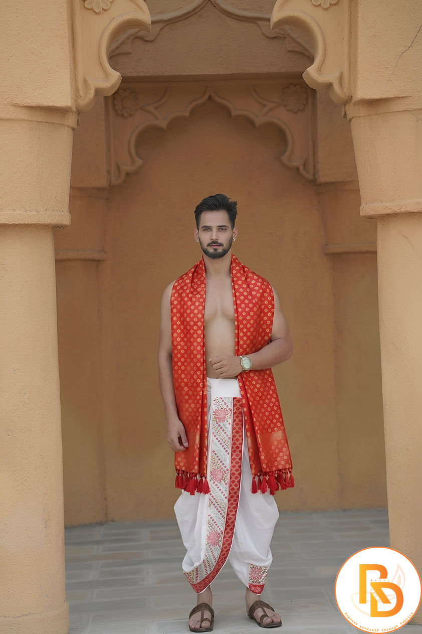 Man wearing a floral border white dhoti and red uparana