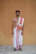 Man wearing a floral design border white cotton dhoti with matching uparana