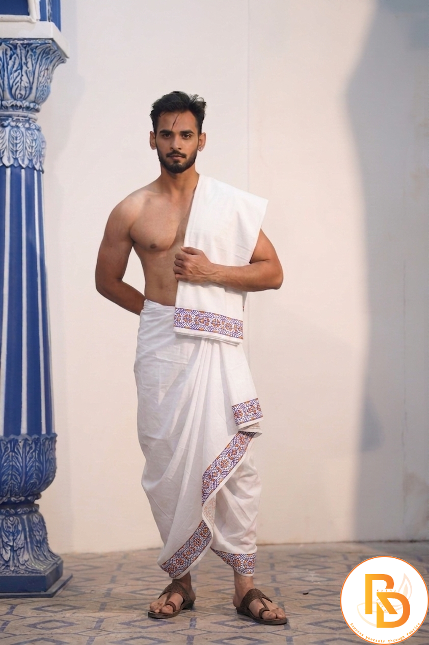 Man wearing a geometric border white cotton dhoti with gamcha