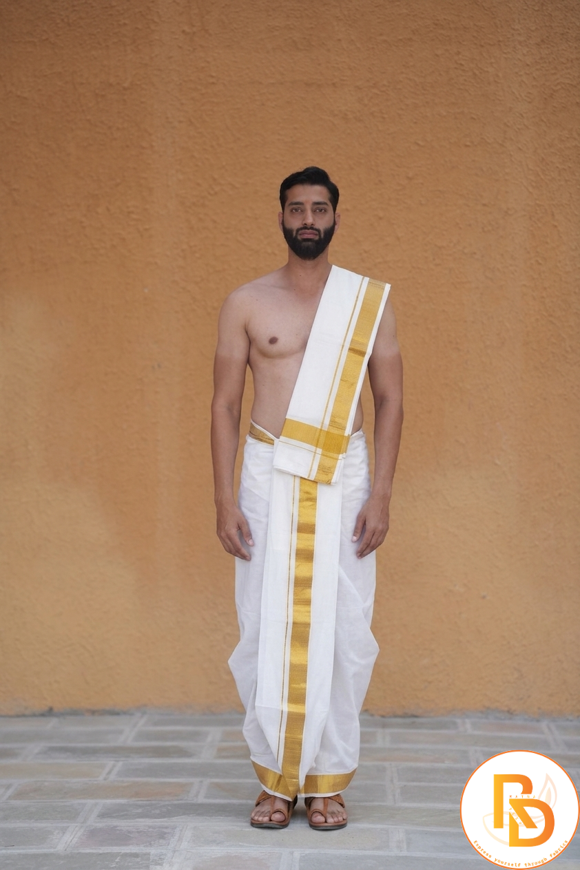 Man wearing a golden zari border white cotton dhoti with matching uparana