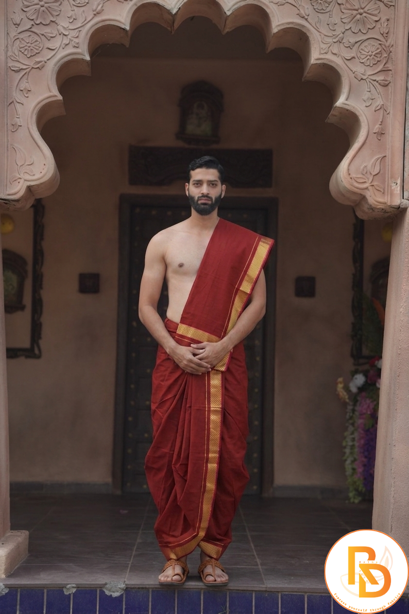 Man wearing a graceful golden border maroon dhoti with uparana