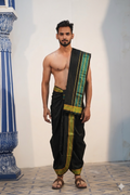 Man wearing a green & golden border black cotton dhoti with matching uparana