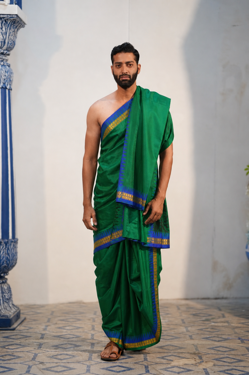 Man wearing a green silk dhoti with matching uparana