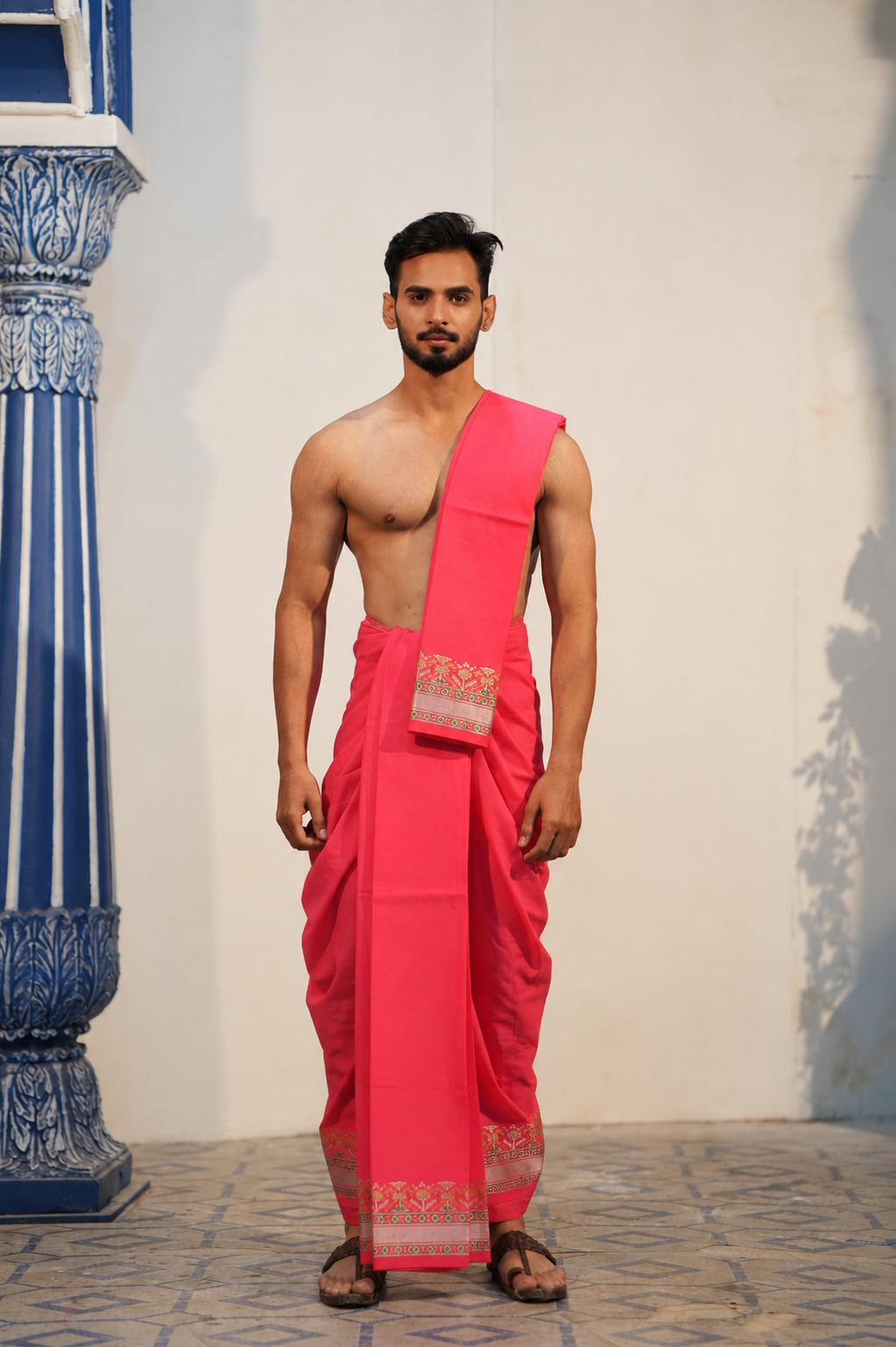 Man wearing a intricate woven border patoda jode semi silk dhoti with uparana