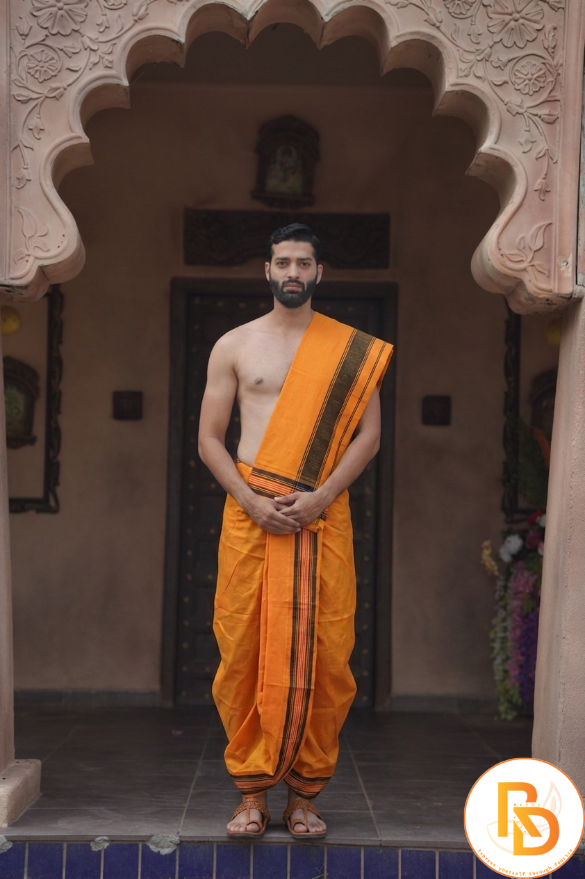 Man wearing a light orange blended cotton dhoti with khes