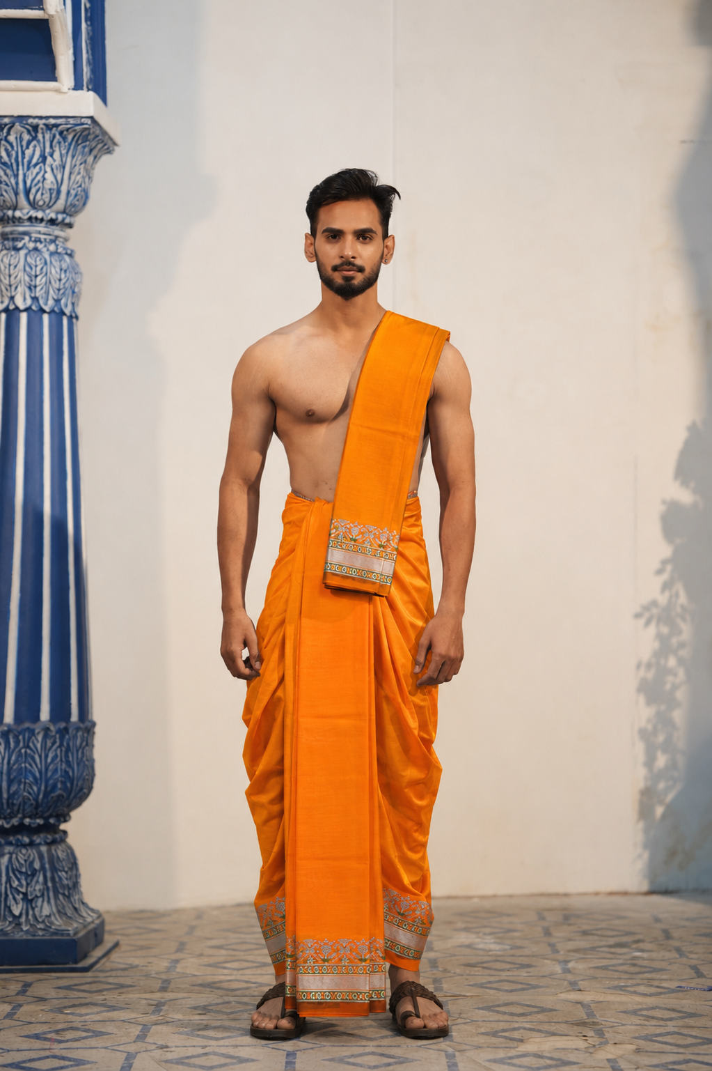 Man wearing a luxurious woven border stylish patoda jode semi silk dhoti with uparana
