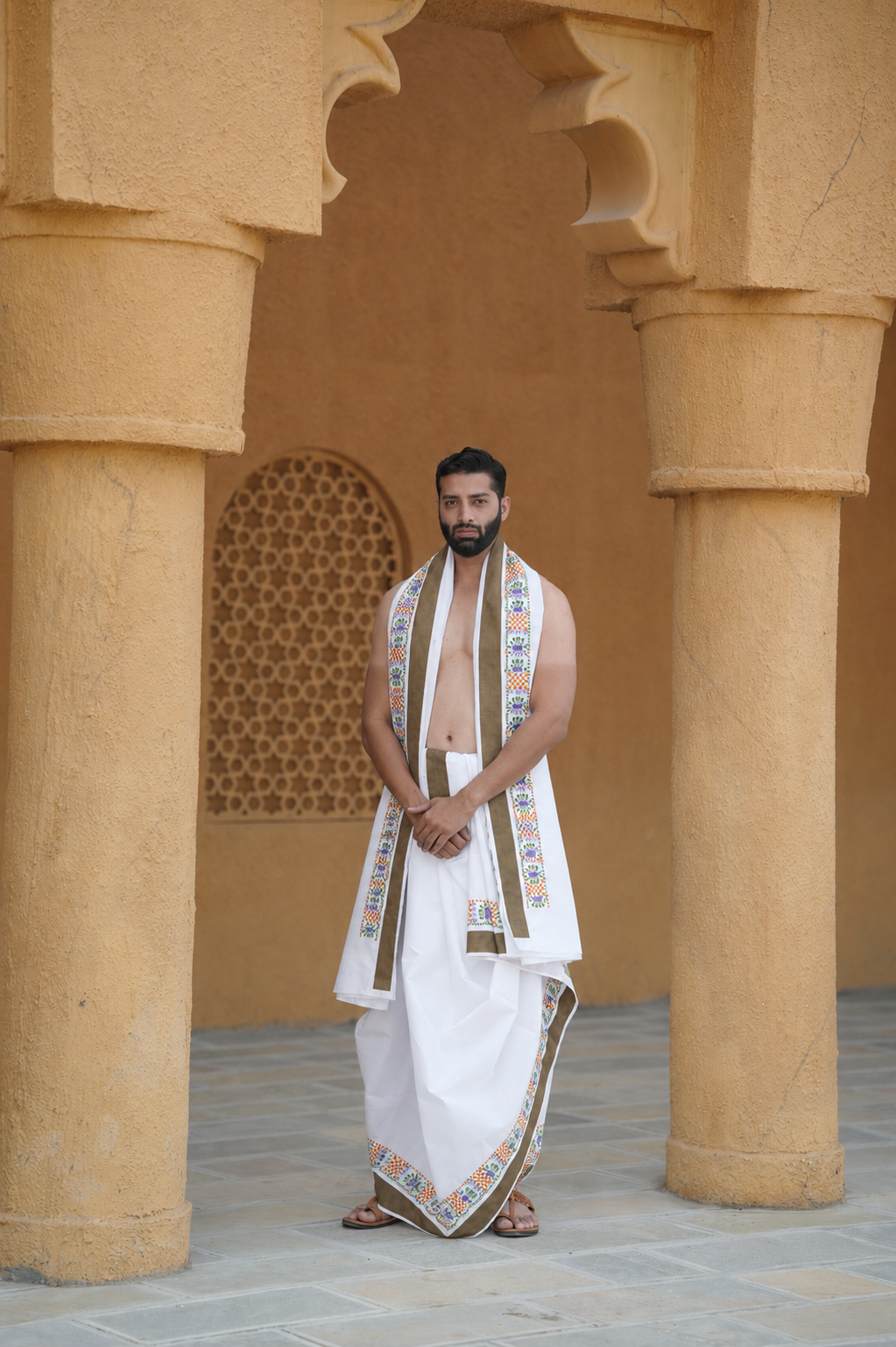 Man wearing a multicolor design and border handwork cotton dhoti with uparana