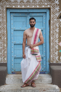 Man wearing a multicolour floral design white cotton dhoti with uparana