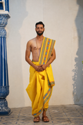 Man wearing a multicolour & floral embroidery yellow cotton dhoti with matching uparana