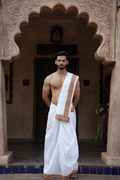 Man wearing a multicolour traditional print border cotton dhoti with uparana