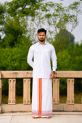 Man wearing a orange border white dhoti and shirt combo