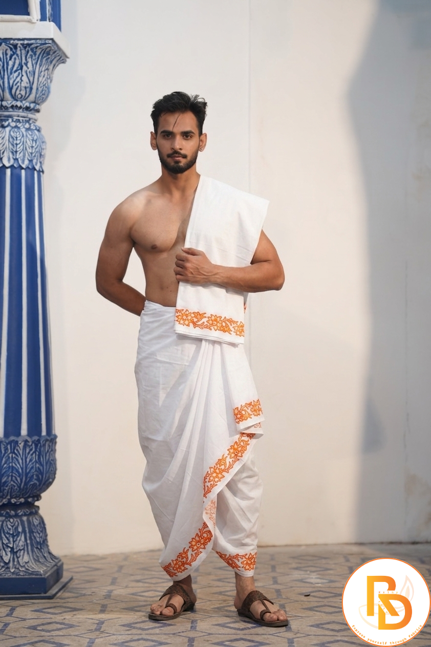 Man wearing a orange floral printed cotton dhoti with khes