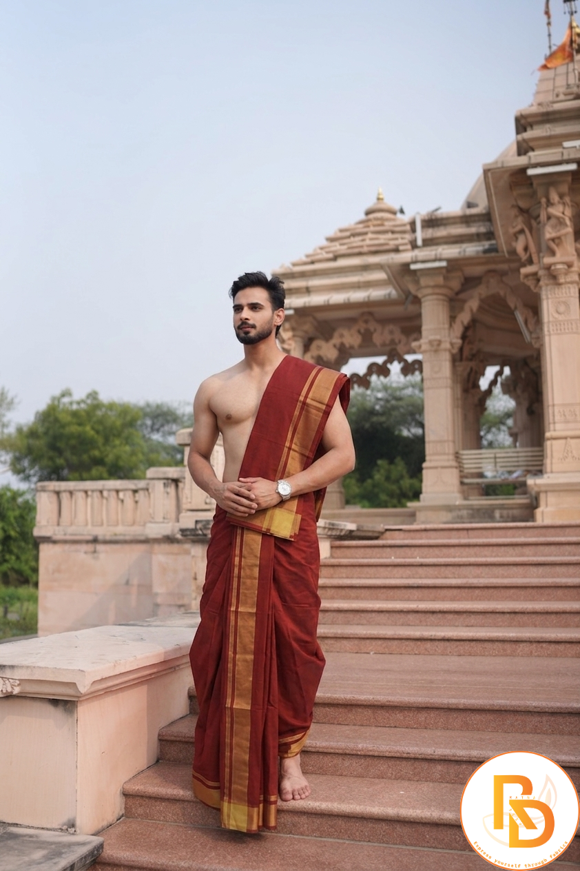 Man wearing a royal gold edition maroon cotton dhoti with uparana