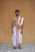 Man wearing a south indian style golden peacock jacquard border dhoti with uparana