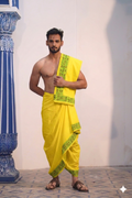 Man wearing a stylish green designing border yellow cotton dhoti with uparana