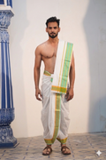 Man wearing a stylish green & golden border white cotton dhoti with matching uparana