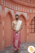 Man wearing a sunflower design border rani pink dhoti with uparana