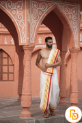 Man wearing a thilani motif print cotton dhoti with uparana