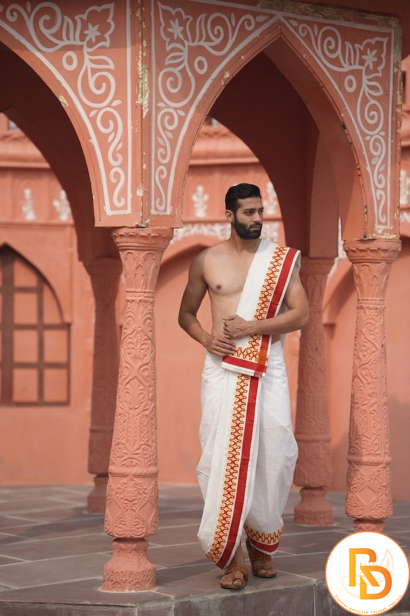 Man wearing a thilani motif printed red border cotton dhoti with uparana