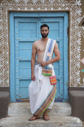 Man wearing a traditional multicolour white pure cotton dhoti with khes