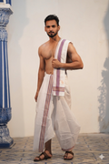 Man wearing a vibrant multicolour stripe border white cotton dhoti with angavastram