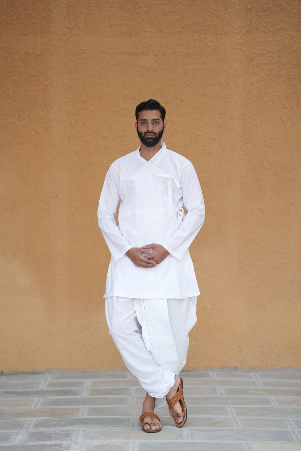 Man wearing white bagal bandi