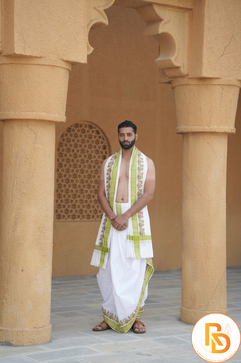 Man wearing a white dhoti with uparana