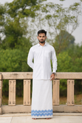 Man wearing a zigzag design border white dhoti and shirt combo